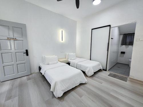 Katil atau katil-katil dalam bilik di VV Homestay