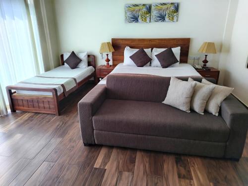Postel nebo postele na pokoji v ubytování Marabedda Gardens Resort