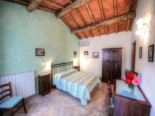 Postel nebo postele na pokoji v ubytování Saturnia Pian Di Cataverna