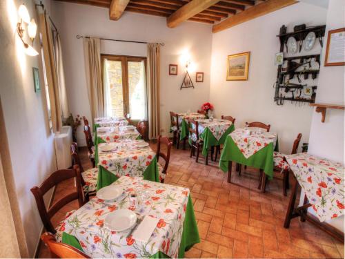 Postel nebo postele na pokoji v ubytování Saturnia Pian Di Cataverna