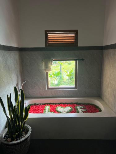 Cama o camas de una habitación en Dewi Teduh Villa