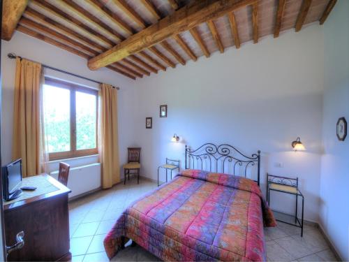Postel nebo postele na pokoji v ubytování Saturnia Pian Di Cataverna