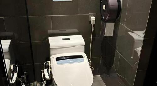Un baño de Shenzhen Hanyong Hotel Fuyong Branch