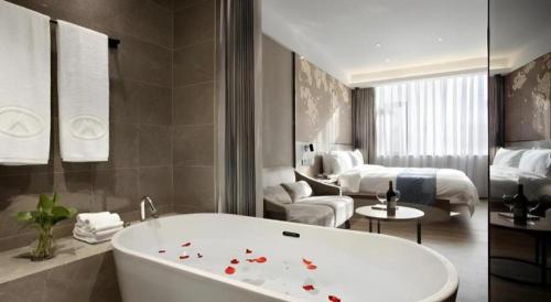 Zona de estar de Shenzhen Hanyong Hotel Fuyong Branch