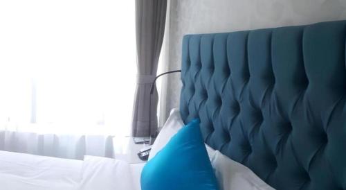 Postel nebo postele na pokoji v ubytování Shanghai Jinchen Hotel