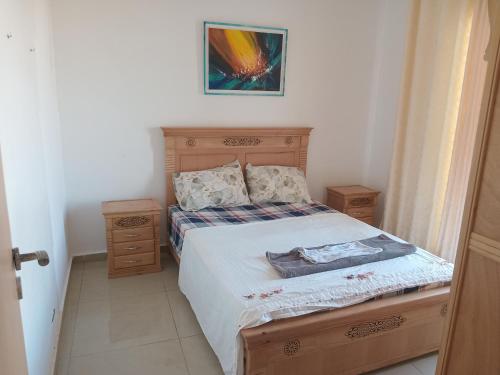 Postel nebo postele na pokoji v ubytování Appartement Familial à la plage houara Tanger-Asilah