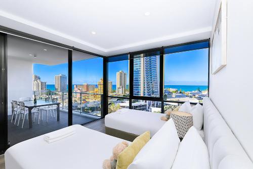 Ένα ή περισσότερα κρεβάτια σε δωμάτιο στο Circle On Cavill Surfers Paradise Apartments-Holiday Paradise