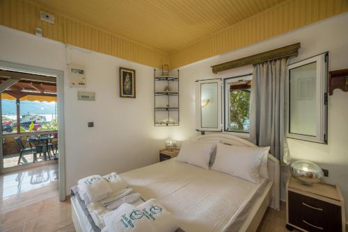 Ένα ή περισσότερα κρεβάτια σε δωμάτιο στο Zante Mare