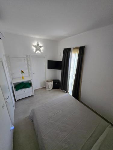Postel nebo postele na pokoji v ubytování B&B Casa Cappuccini