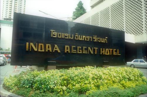 a sign for an indian resort hotel in a city at Indra Regent Hotel in Bangkok