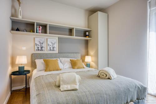 Ένα ή περισσότερα κρεβάτια σε δωμάτιο στο Apartment Abrega with private pool