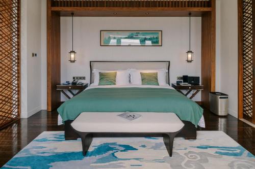 Postel nebo postele na pokoji v ubytování Honor Hotels & Resorts · Yun Shu Dali