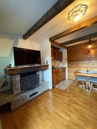 Et tv og/eller underholdning på Appartamento Montebello