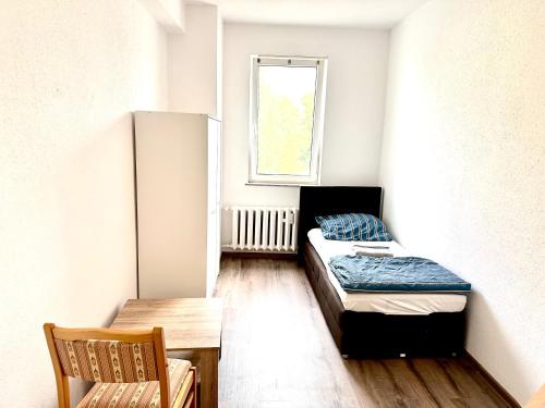 Postel nebo postele na pokoji v ubytování Pension Jasmin A