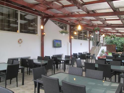 Restaurace v ubytování Pensiunea Doneli