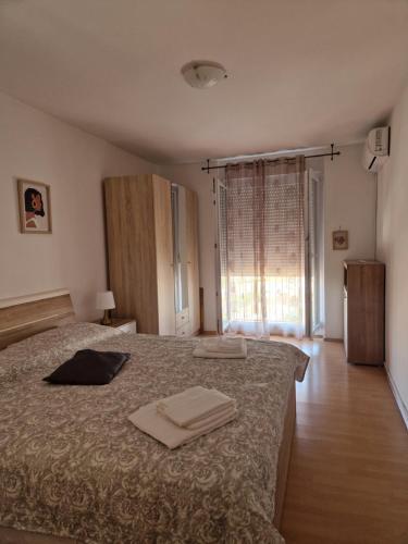 Postel nebo postele na pokoji v ubytování Apartment Mirela