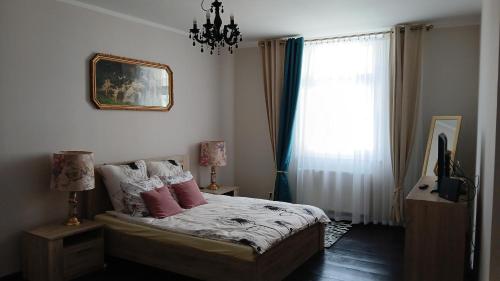 Postel nebo postele na pokoji v ubytování Kupiecka 4 centrum miasta