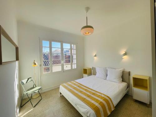 Katil atau katil-katil dalam bilik di Appartement T3 - 2ème étage