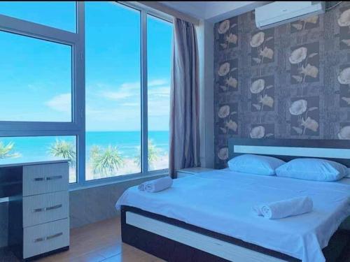 Postel nebo postele na pokoji v ubytování Hotel OLIMP SHEKVETILI