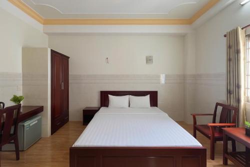 Katil atau katil-katil dalam bilik di Spring Hung Anh Hotel - Sân Bay TSN