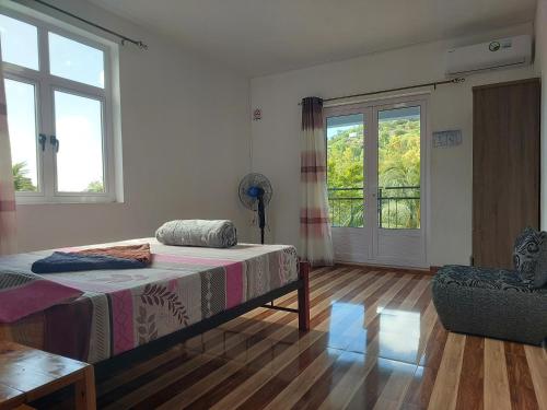 Postel nebo postele na pokoji v ubytování Villa Elyza