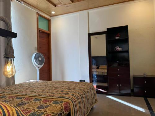 Katil atau katil-katil dalam bilik di Bhurban Smart Villas