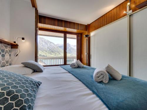 Posteľ alebo postele v izbe v ubytovaní T2 lumineux à Tignes, balcon sud, 4-5 personnes - FR-1-641-71