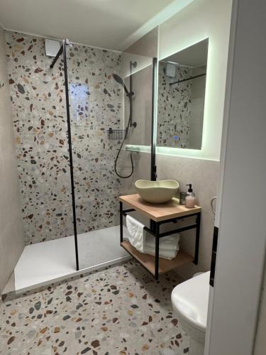 a bathroom with a sink and a shower at Ameli Heritage rooms & apartments in Zadar