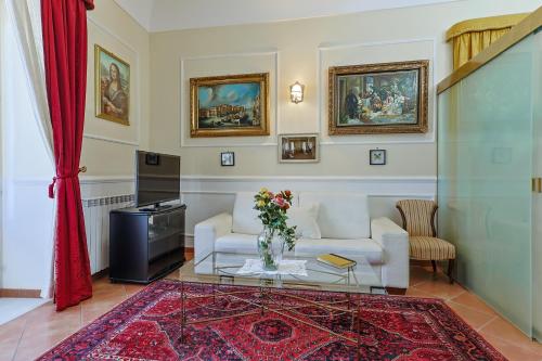 a living room with a couch and a table at La casa di Dante in Palermo
