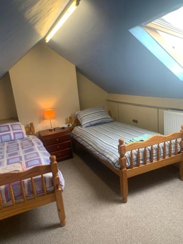 Ένα ή περισσότερα κρεβάτια σε δωμάτιο στο Room only guest accommodation, guest house self catering