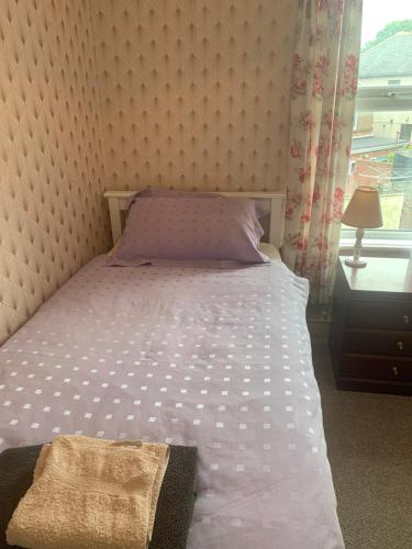 Ένα ή περισσότερα κρεβάτια σε δωμάτιο στο Room only guest accommodation, guest house self catering