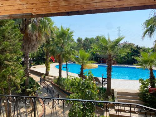 a view of the pool from the balcony of a resort at LEMAS SUITE HOTEL in Side