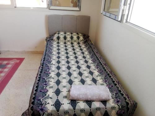 Ένα ή περισσότερα κρεβάτια σε δωμάτιο στο APPARTEMENT Soussun Familles&Couples mariés