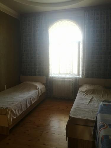Ένα ή περισσότερα κρεβάτια σε δωμάτιο στο Bağ evi