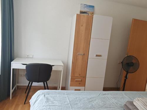 Ένα ή περισσότερα κρεβάτια σε δωμάτιο στο Garten Apartment