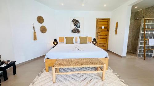 Voodi või voodid majutusasutuse Villa Chanalu toas