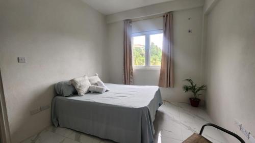 Postel nebo postele na pokoji v ubytování Destiny Suites