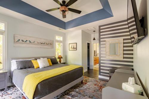 a bedroom with a bed and a blue ceiling at Majestic views of Mountains and Water- The Perch in Lake Lure