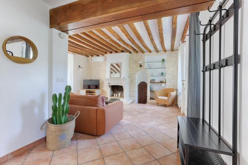 Et opholdsområde på Appartement avec jardin - A 10 minutes de Disneyland