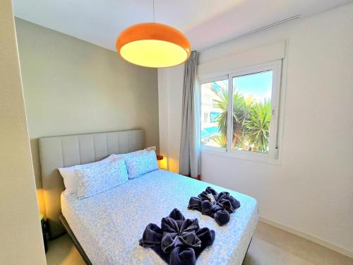 Sunshine Blue Skies and Seaview 2 Bedroom Apartment Seasonal Pool Free wifi and dedicated workspace by NAMASTE ELITE