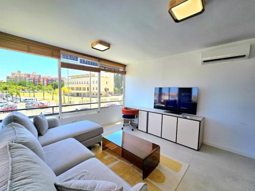 Sunshine Blue Skies and Seaview 2 Bedroom Apartment Seasonal Pool Free wifi and dedicated workspace by NAMASTE ELITE