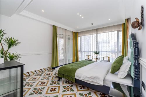 a bedroom with a bed and a large window at Misty Nest High Altitude River View B&B Hongyadong Branch in Chongqing