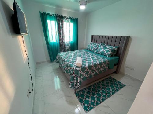 Postel nebo postele na pokoji v ubytování Ocean View Apartment in Santo Domingo Este