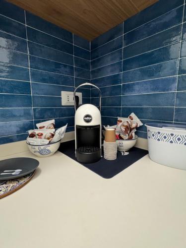 a coffee maker sitting on a counter in a kitchen at Casa Vacanze Marinella Beach in San Vito lo Capo