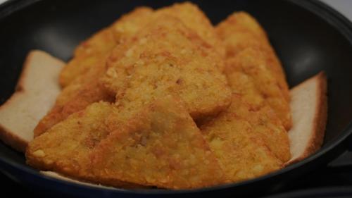 a close up of a bowl of fried food at Fairfield by Marriott Yining in Yining