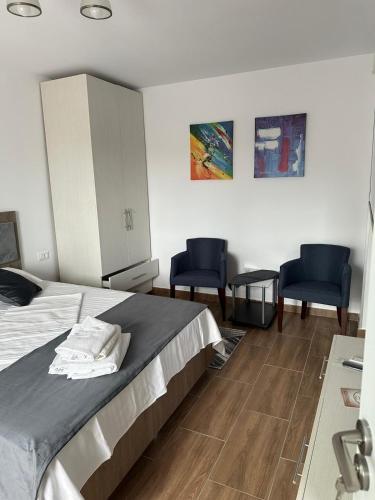 Postel nebo postele na pokoji v ubytování Garsoniera VICTORIA
