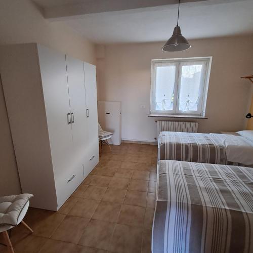Postel nebo postele na pokoji v ubytování Isangarda Apartment