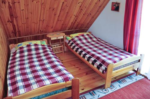 Domek Kopalinoにあるベッド