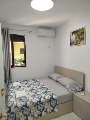 เตียงในห้องที่ Beachside comfy apartment