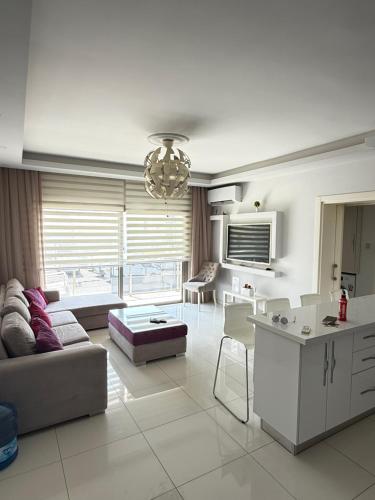 a living room with a couch and a table at Nicosia's Diamond in Nicosia